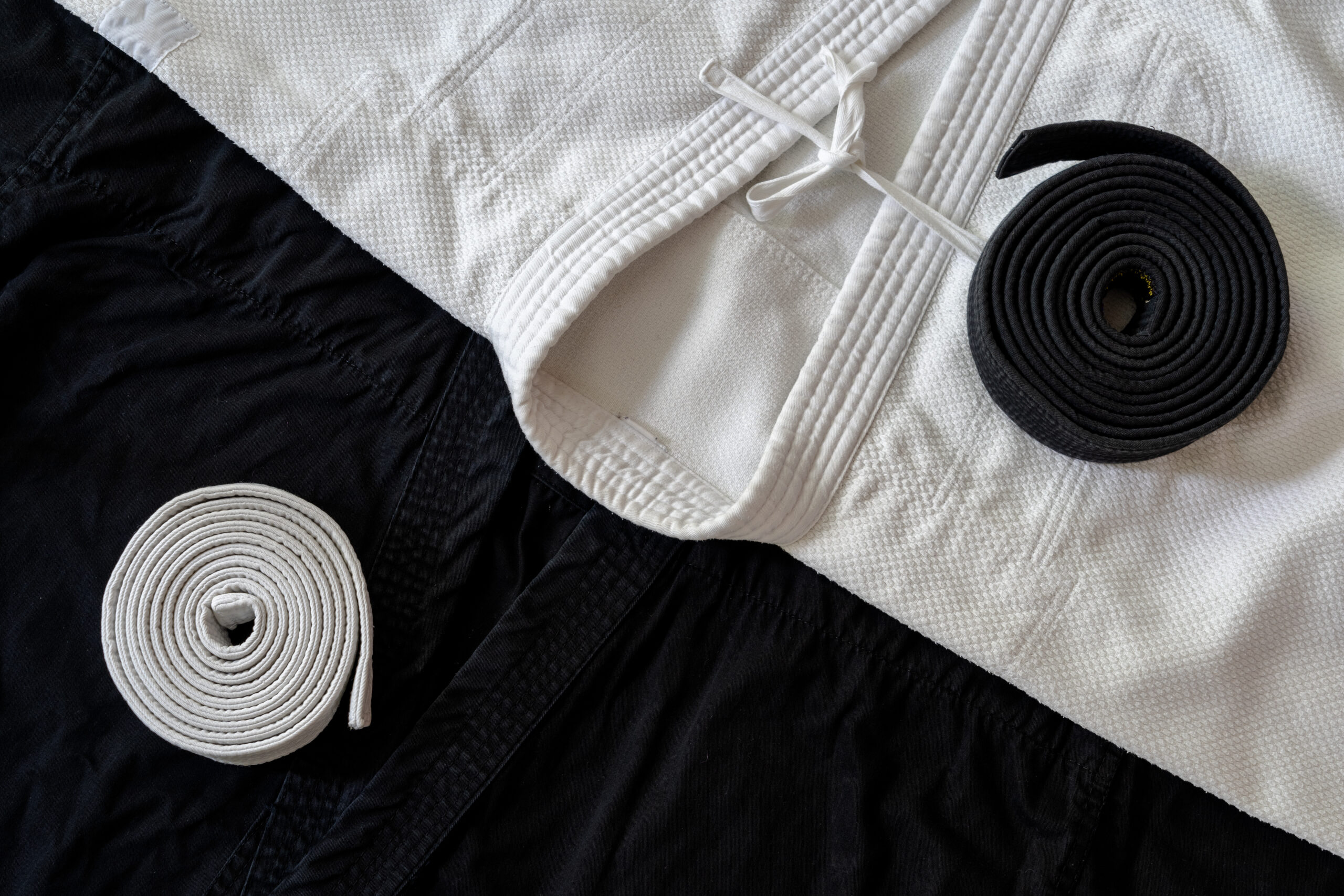 black and white belts on a dobok